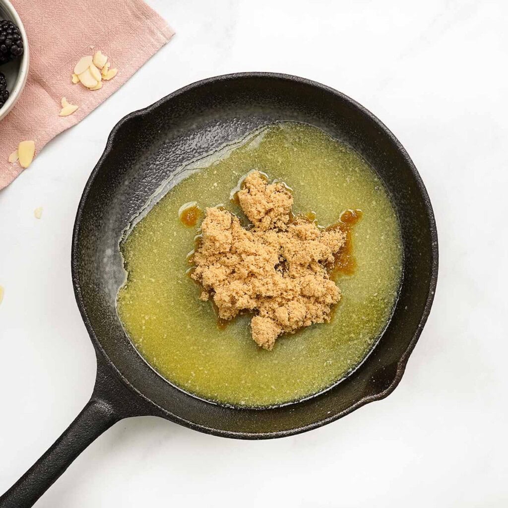 Melted butter and brown sugar in skillet.