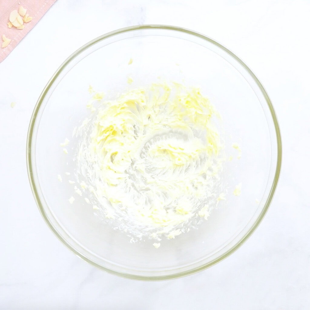 Butter creamed in glass bowl.