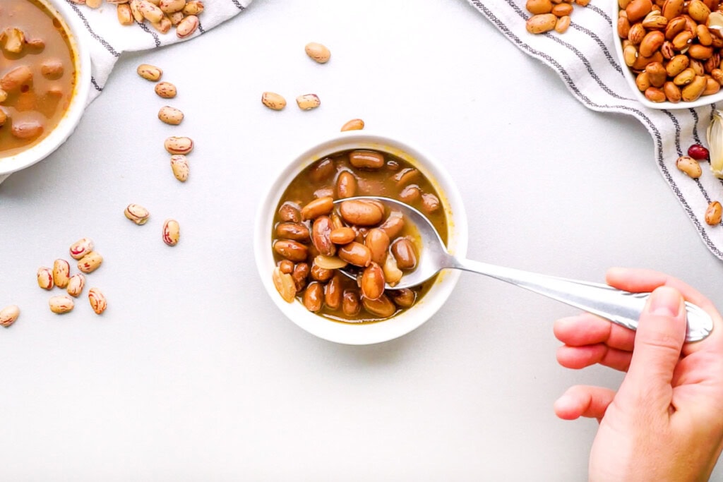Ranch Style Beans scooped up by spoon.