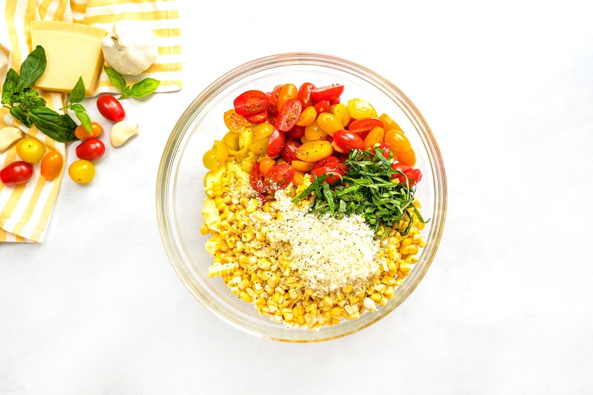 Pasta salad with tortellini and other ingredients in bowl.