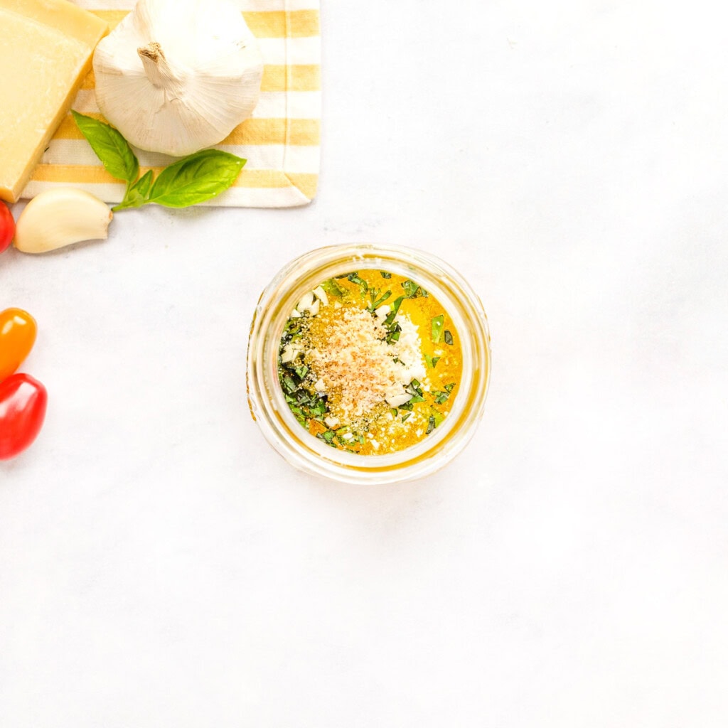 Vinaigrette ingredients in jar.