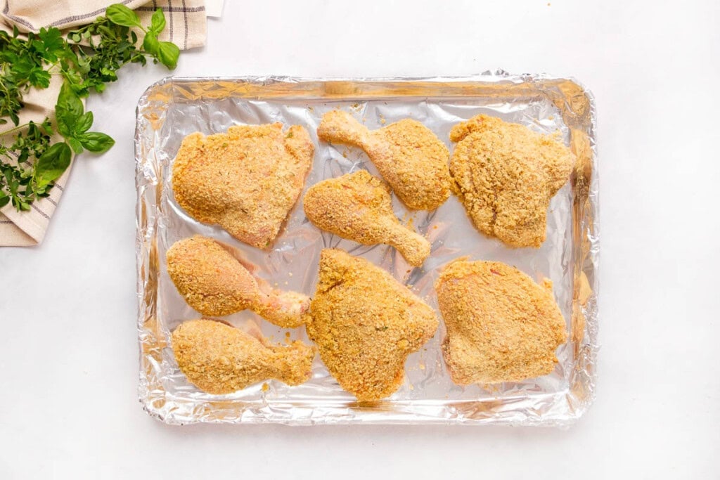 Baked Italian Chicken on baking sheet, ready for the oven.
