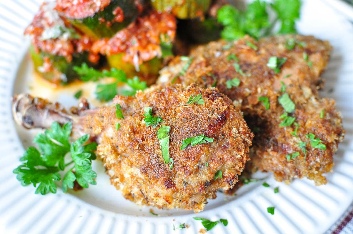 Baked chicken on plate.