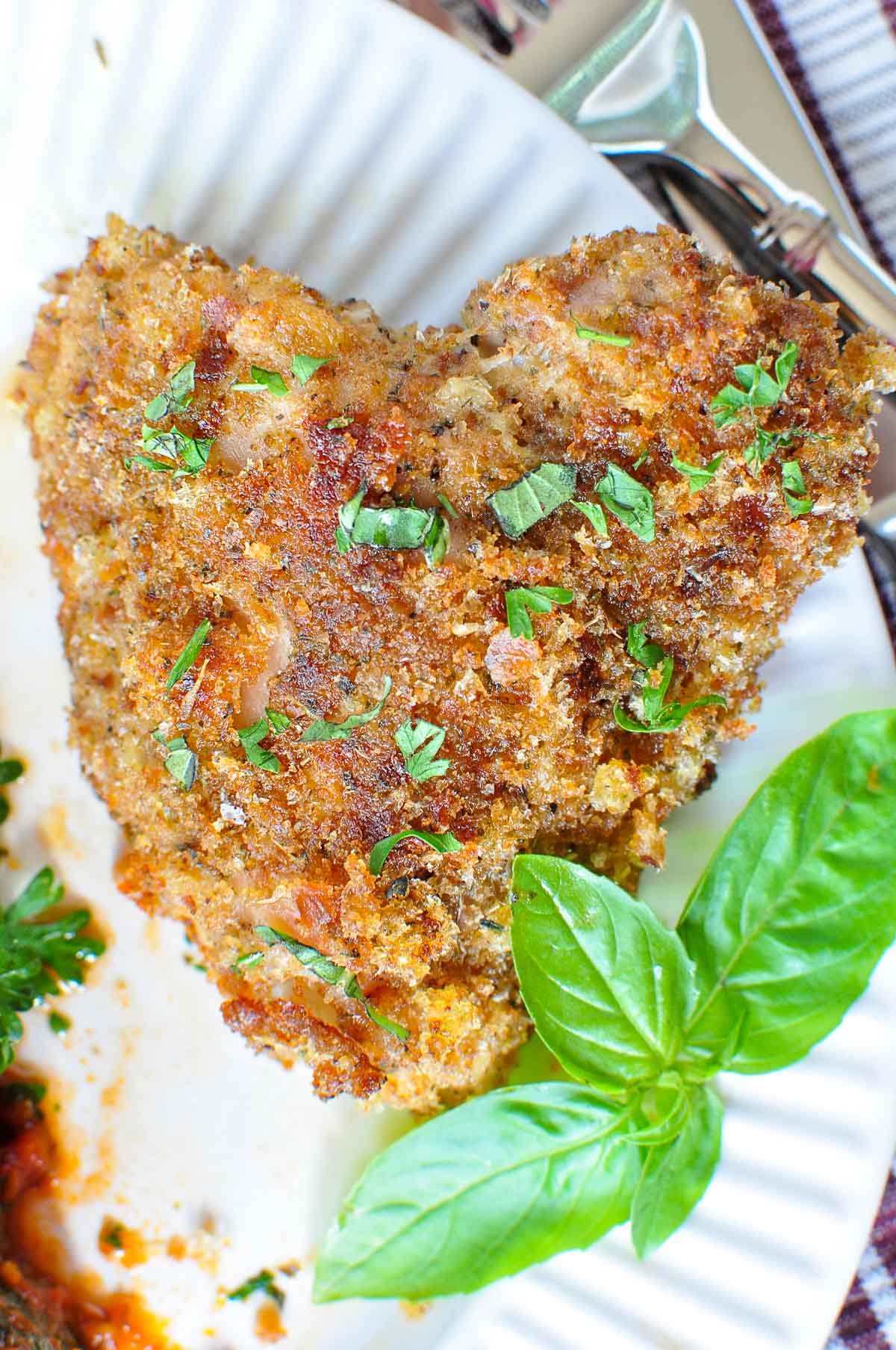 Heart-shaped piece of Baked Italian Chicken.