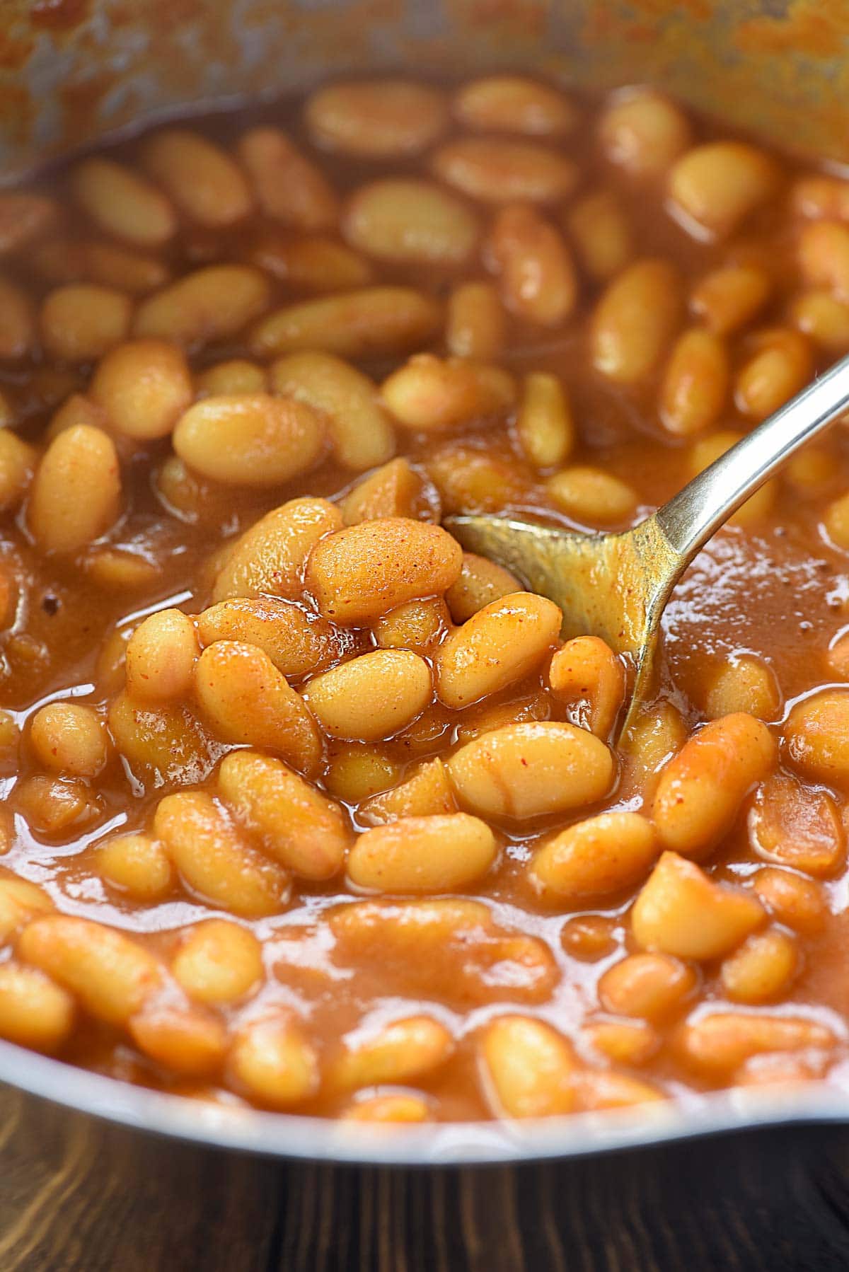 Easy Baked Beans close-up with spoon.