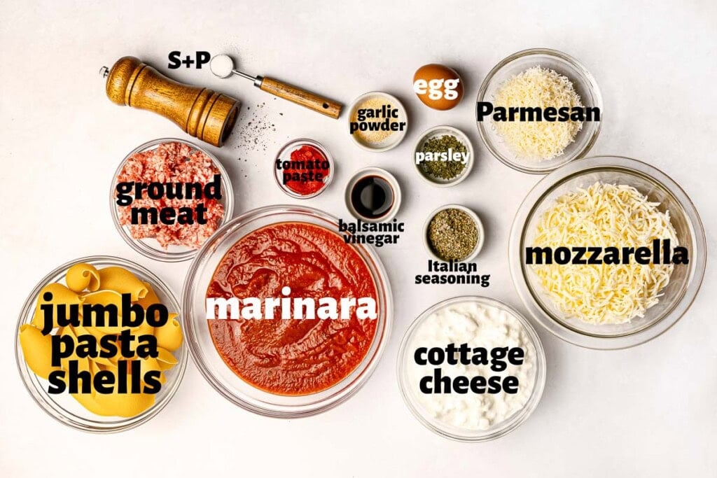 Labeled ingredients to make stuffed shells recipe with meat.