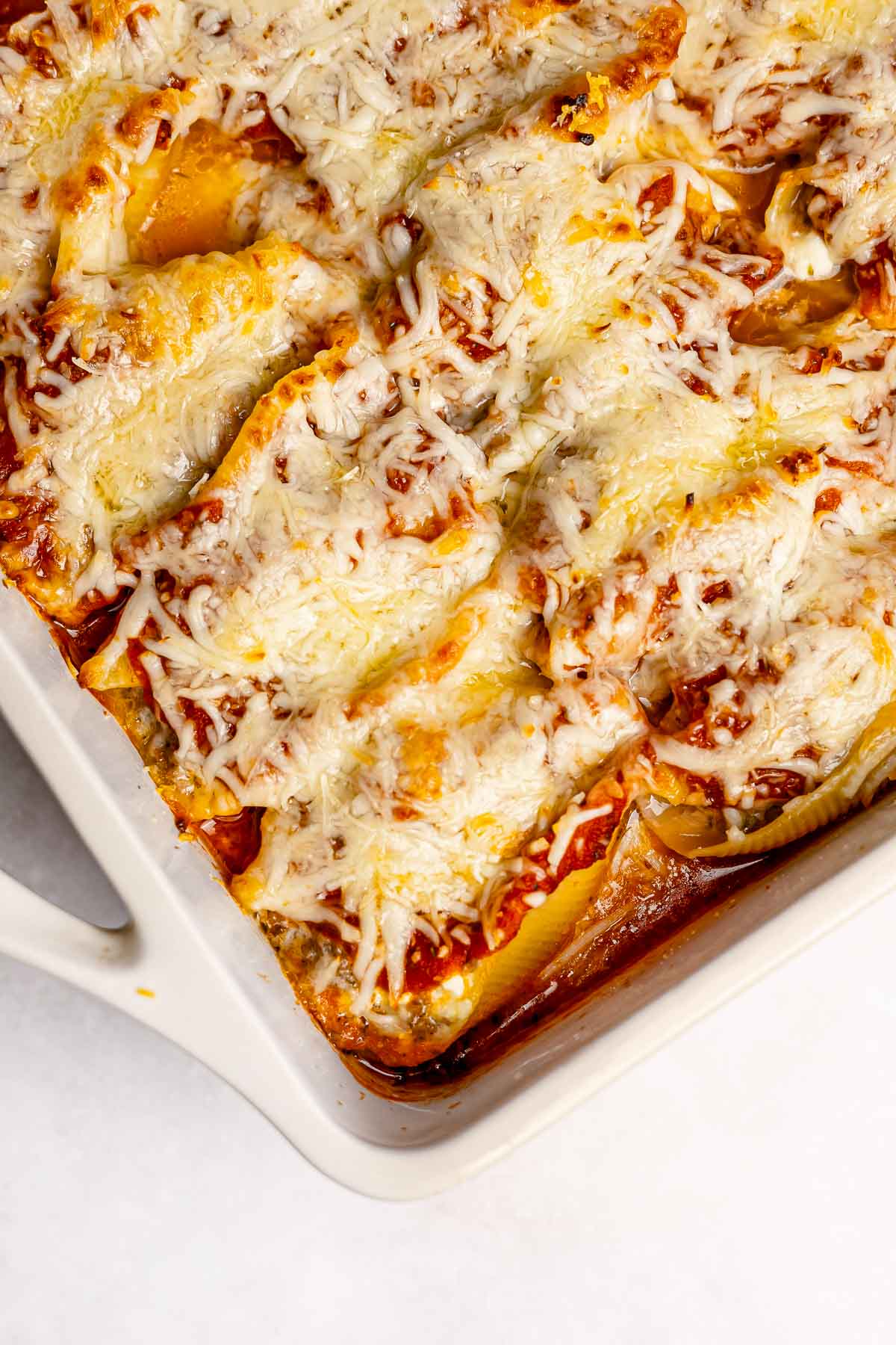 Stuffed Shells with Meat in baking dish.