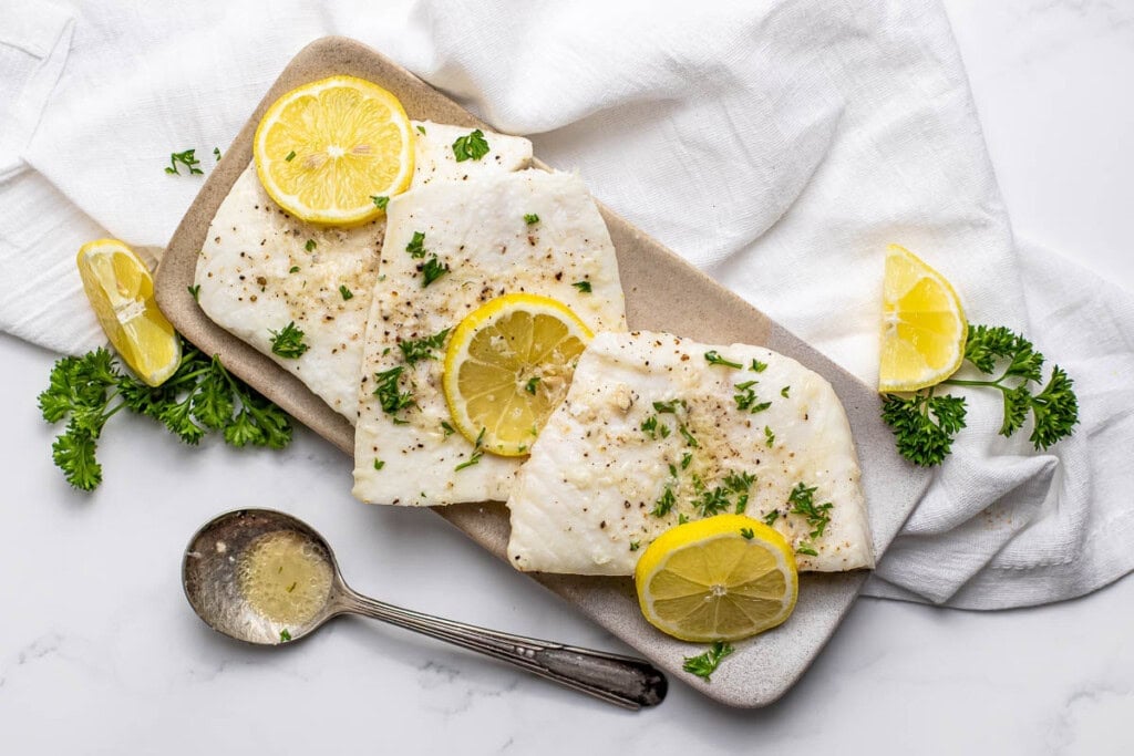 Baked Halibut with lemon garlic butter ready to serve.