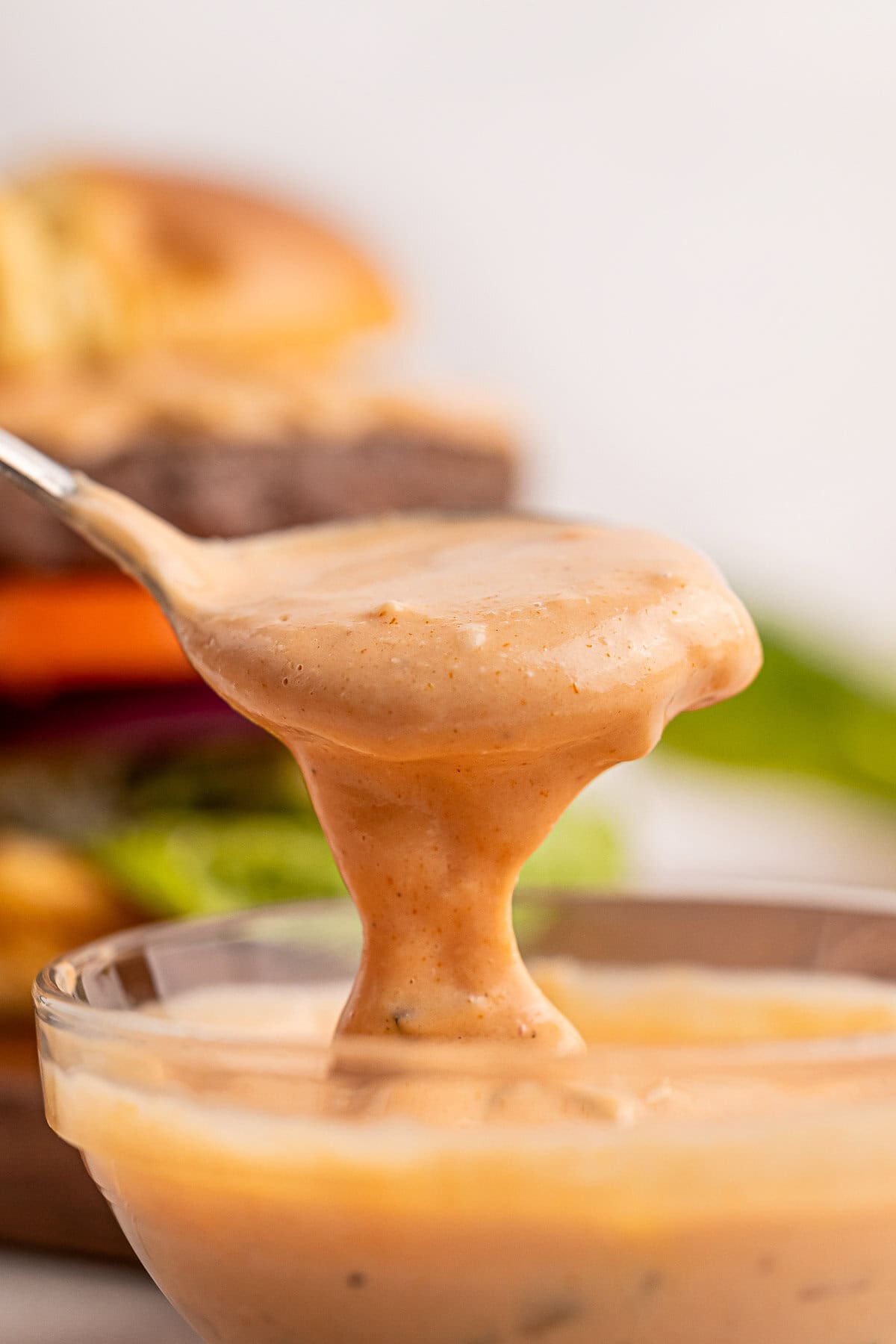 Burger Sauce scooped with spoon.
