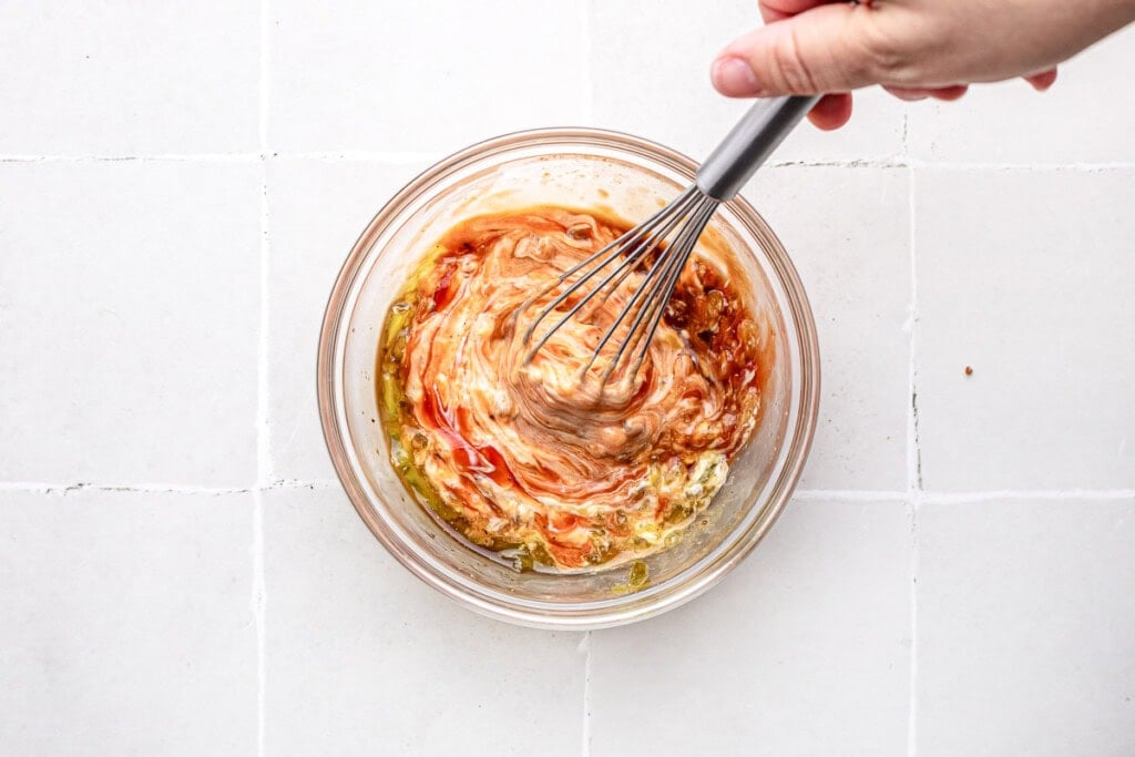 How to make burger sauce by whisking together ingredients.