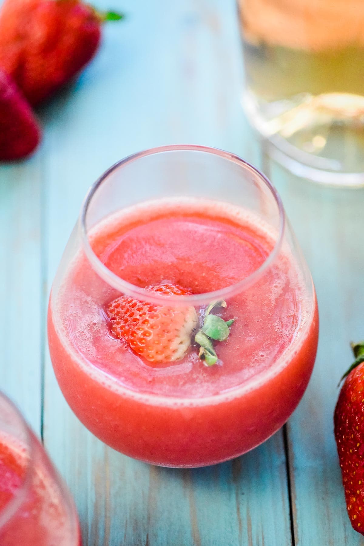 Frose recipe with floating strawberry.