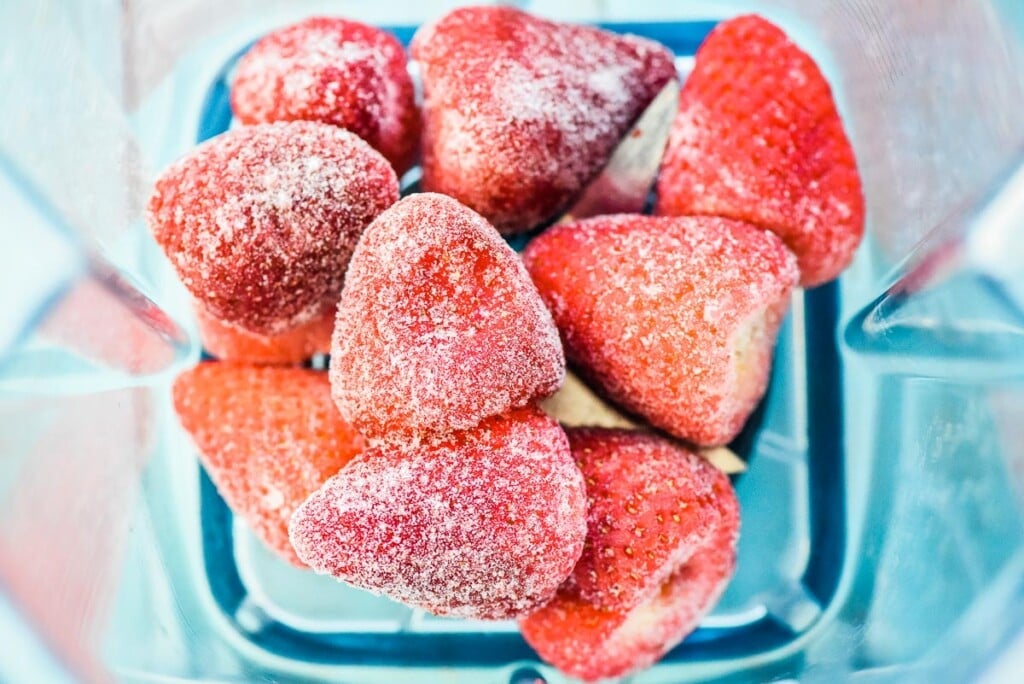 Frozen strawberries in blender.