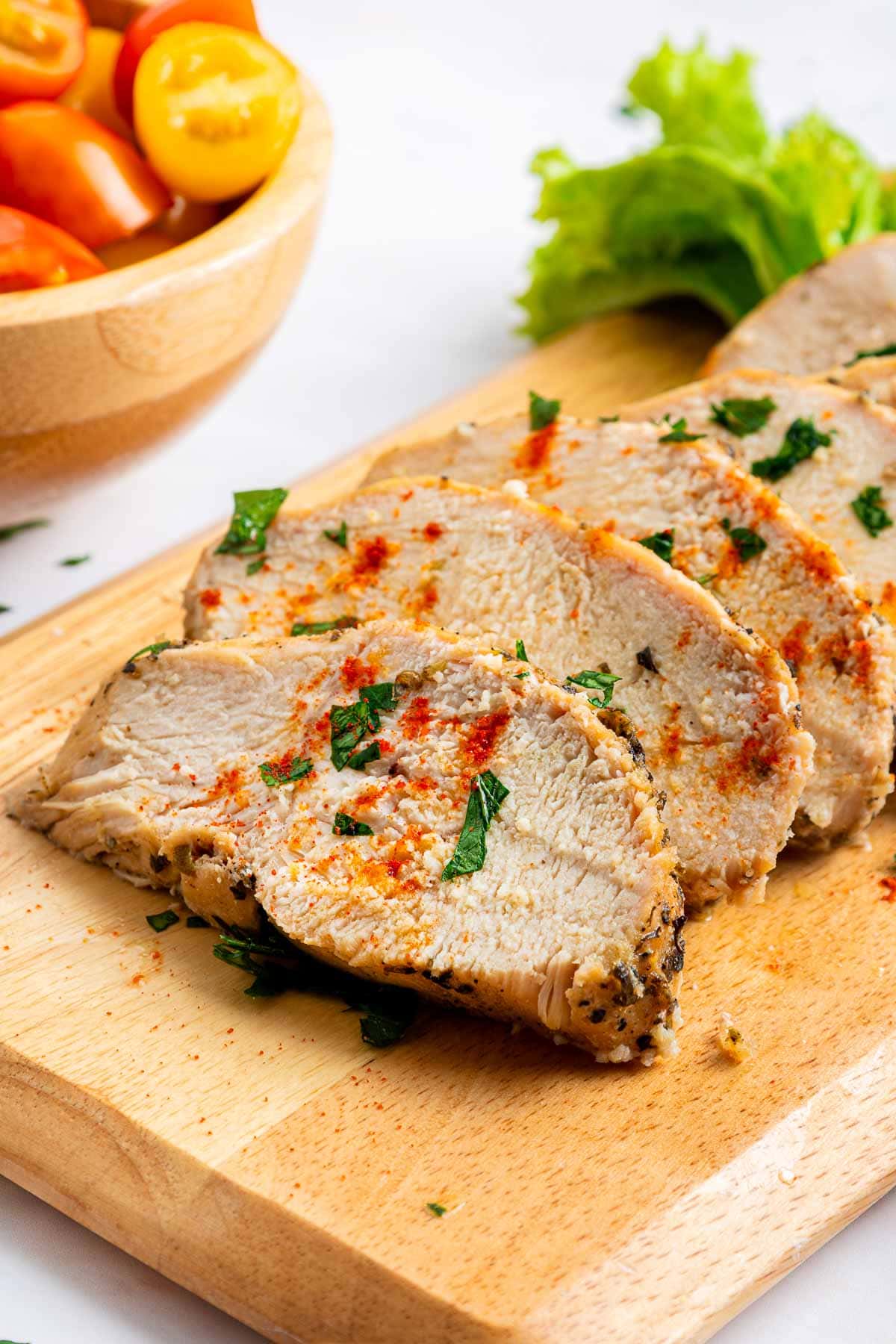 Mediterranean Chicken Marinade with parsley garnish.