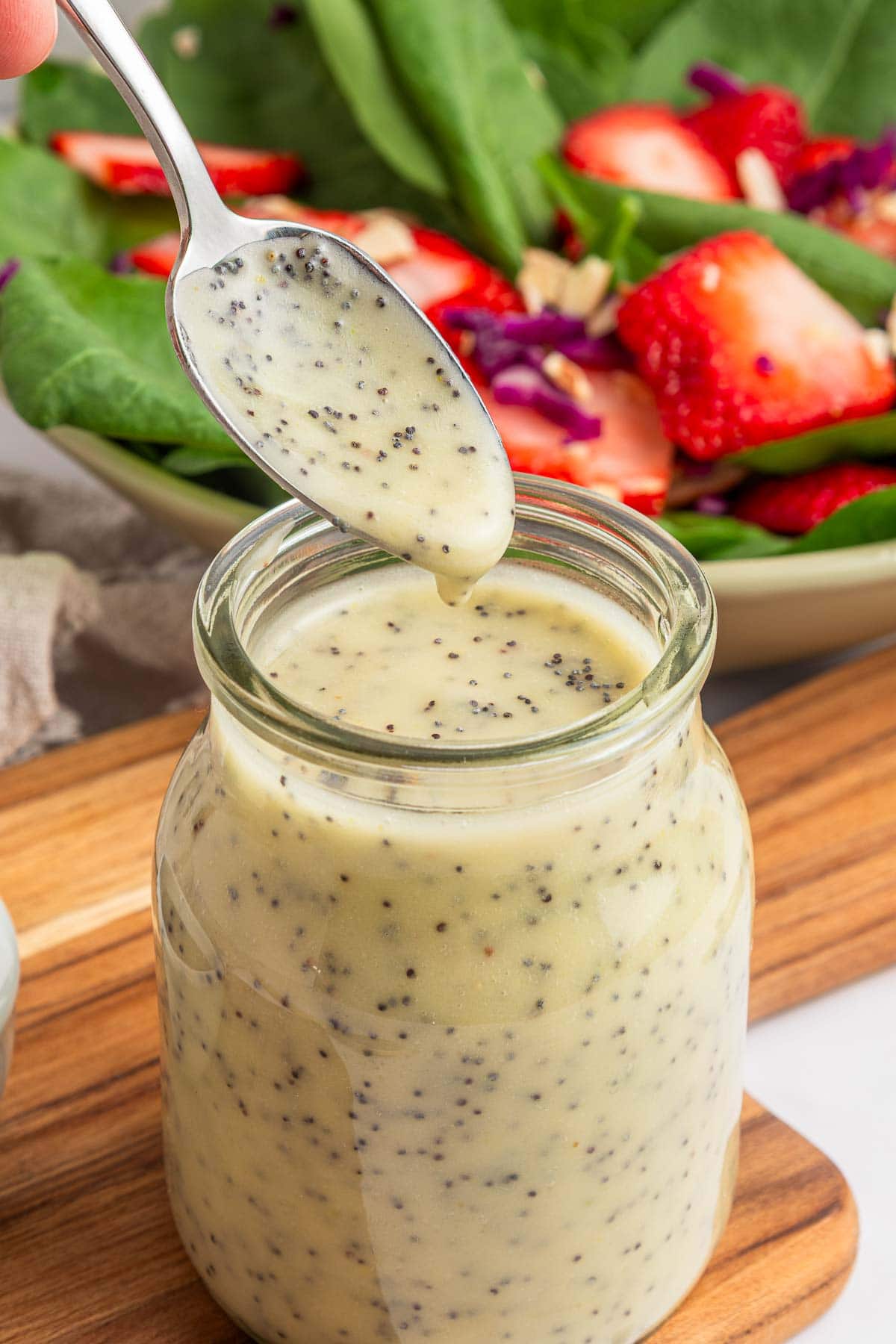 Poppy Seed Salad Dressing on spoon.
