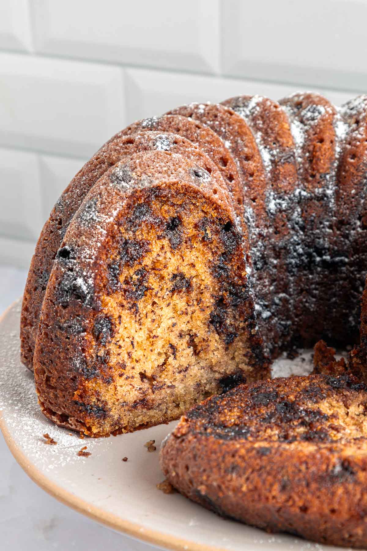Banana Chocolate Chip Cake on cake stand.