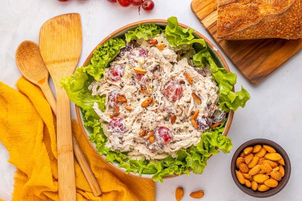Chicken Salad with Grapes in lettuce lined bowl.