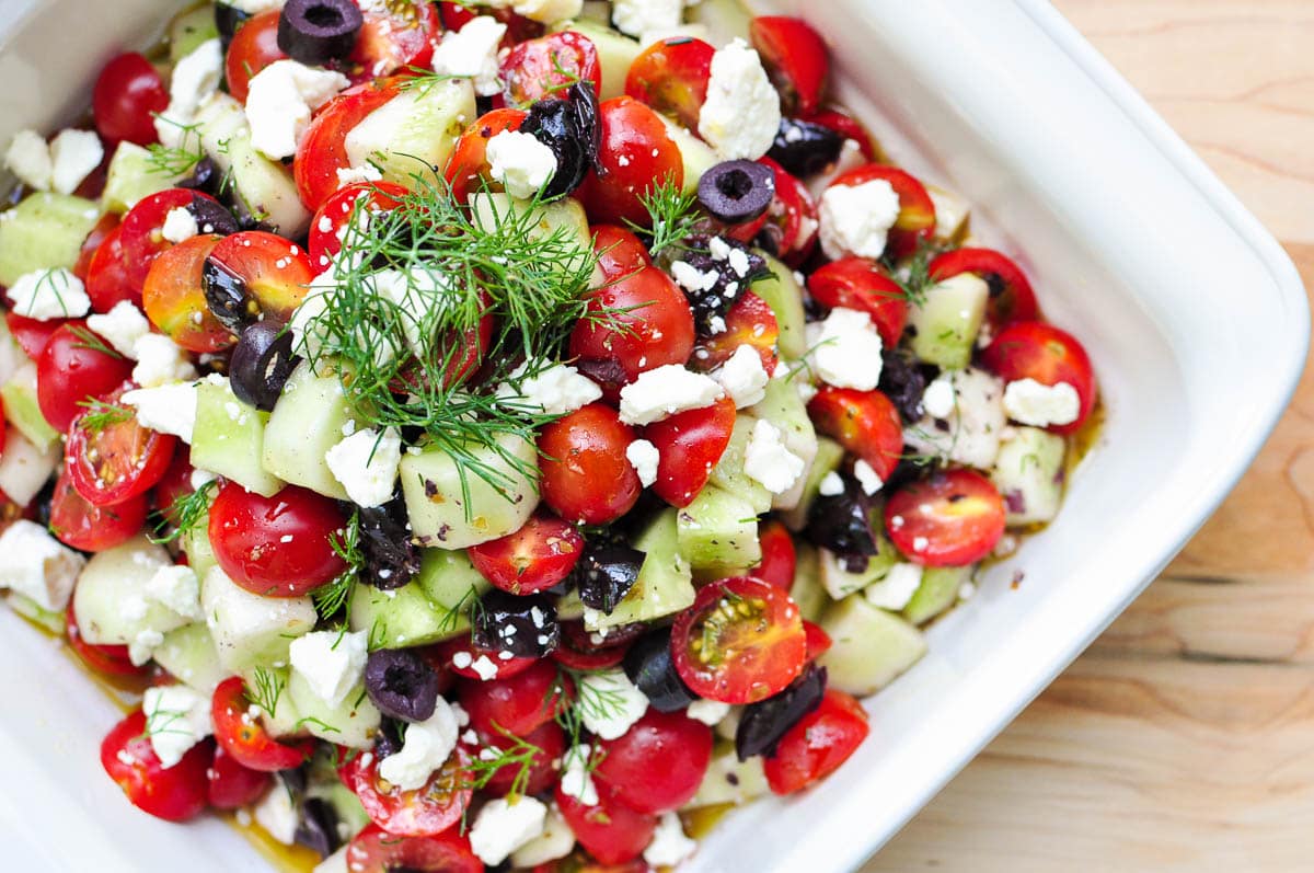 Aerial view of Cucumber Tomato Feta Salad in bowl.