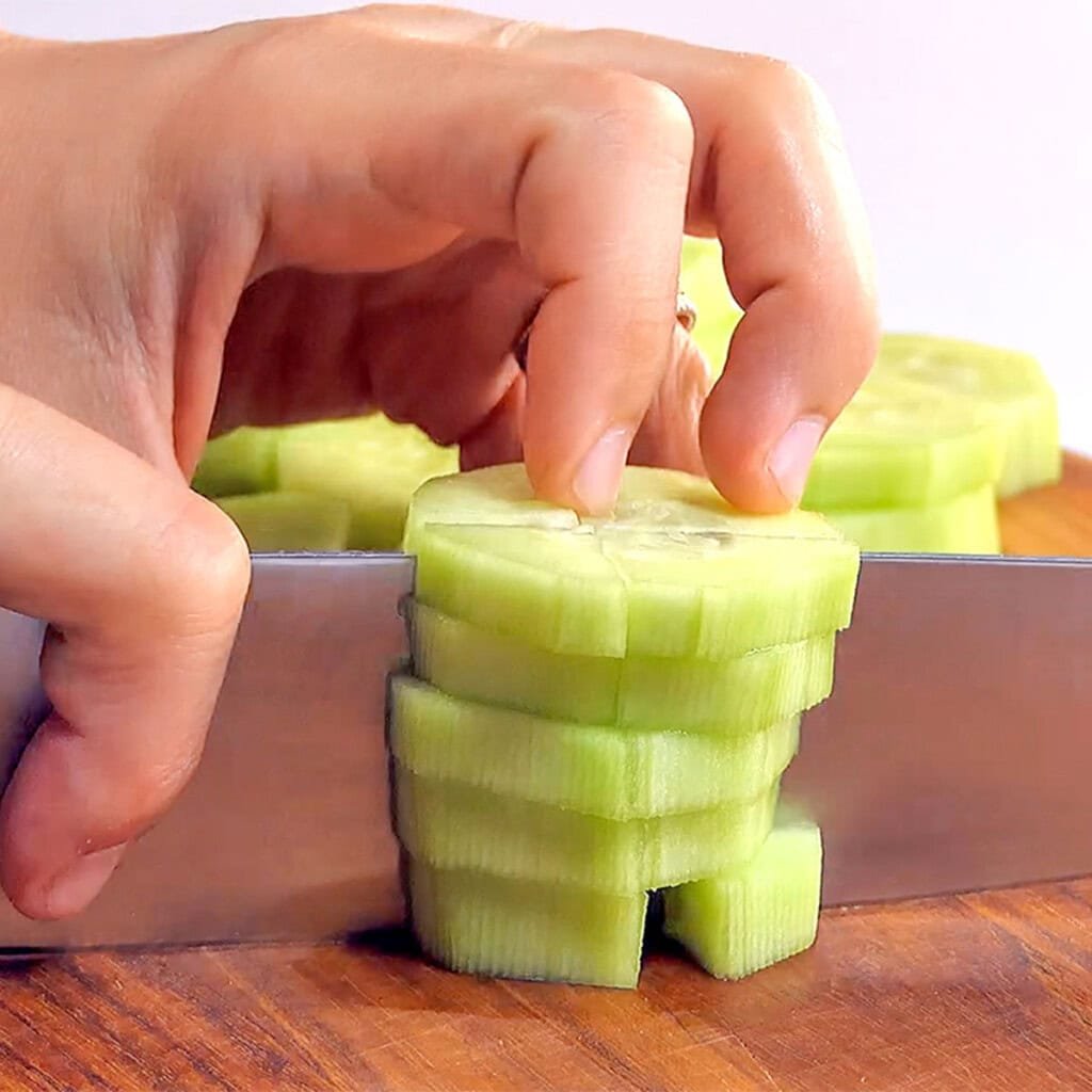 Dicing cucumbers.