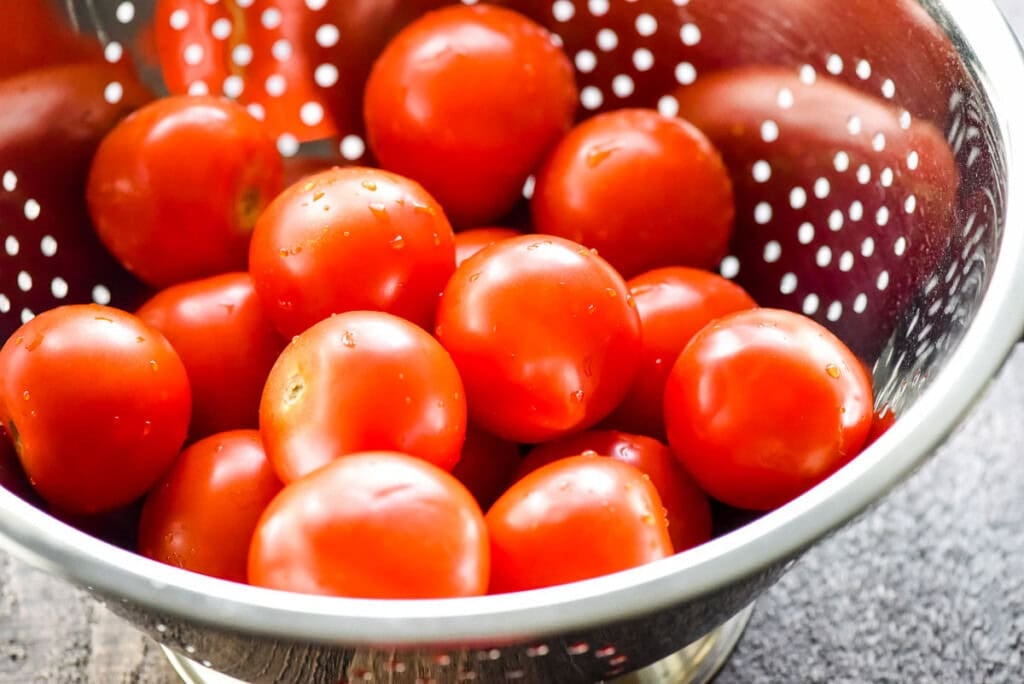Tomatoes in colander.