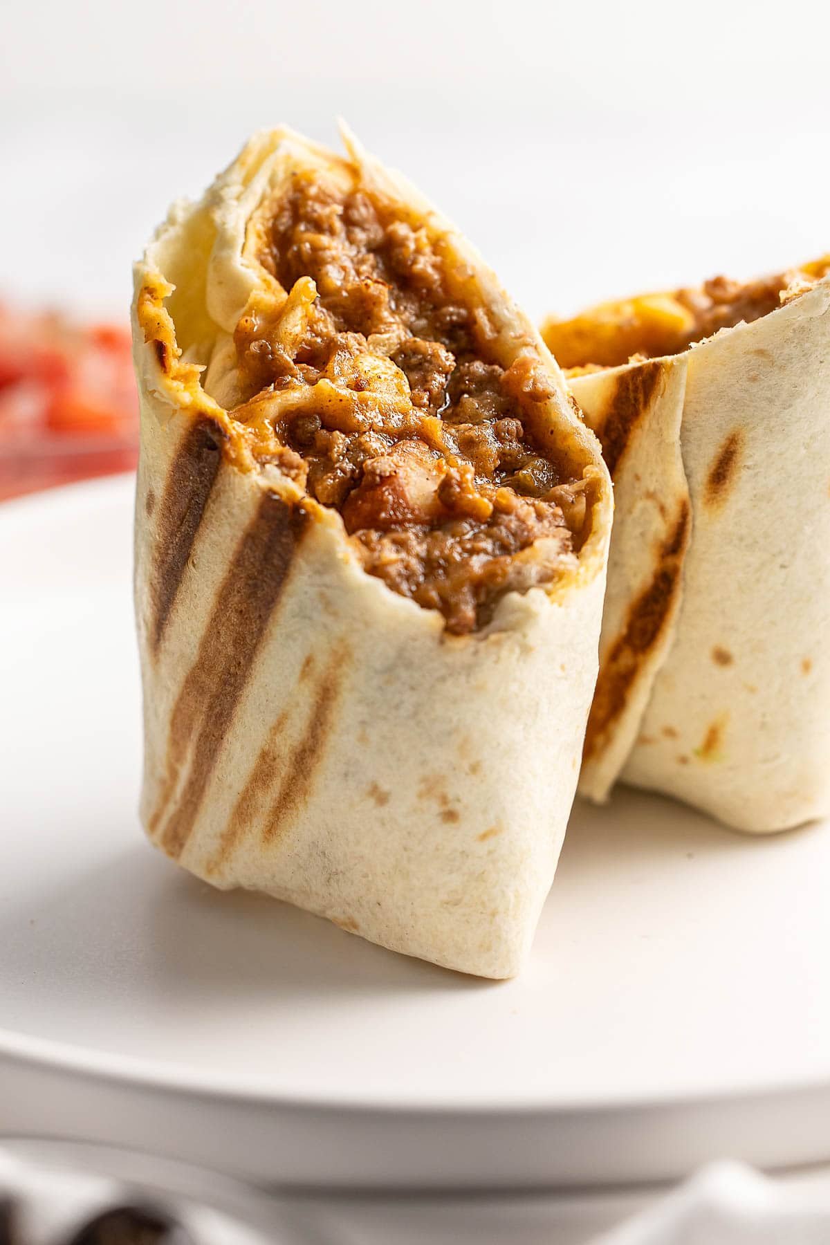 Beef and Bean Burritos cut in half.
