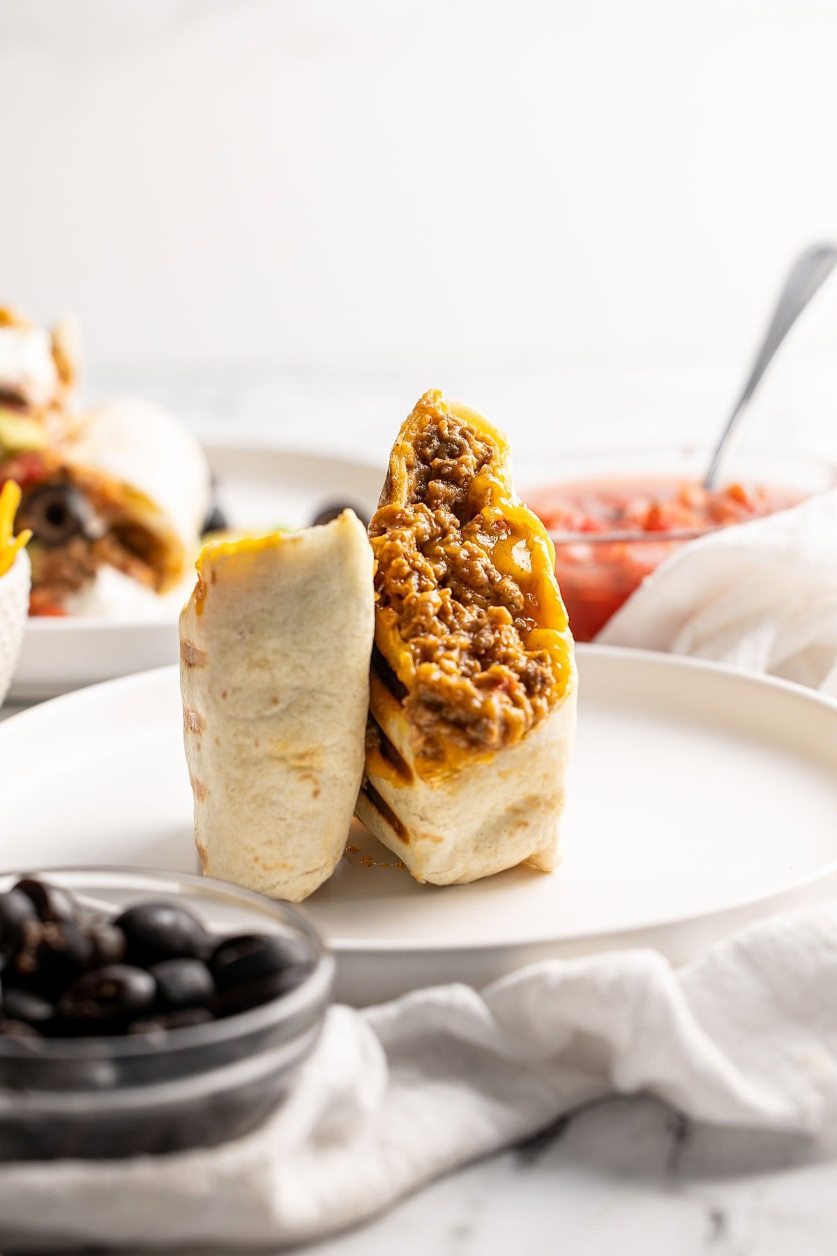 Beef and Bean Burritos recipe on plate.