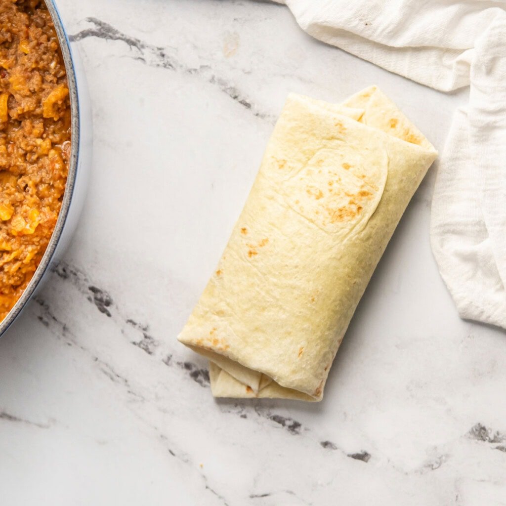 Beef and Bean Burrito folded on counter.