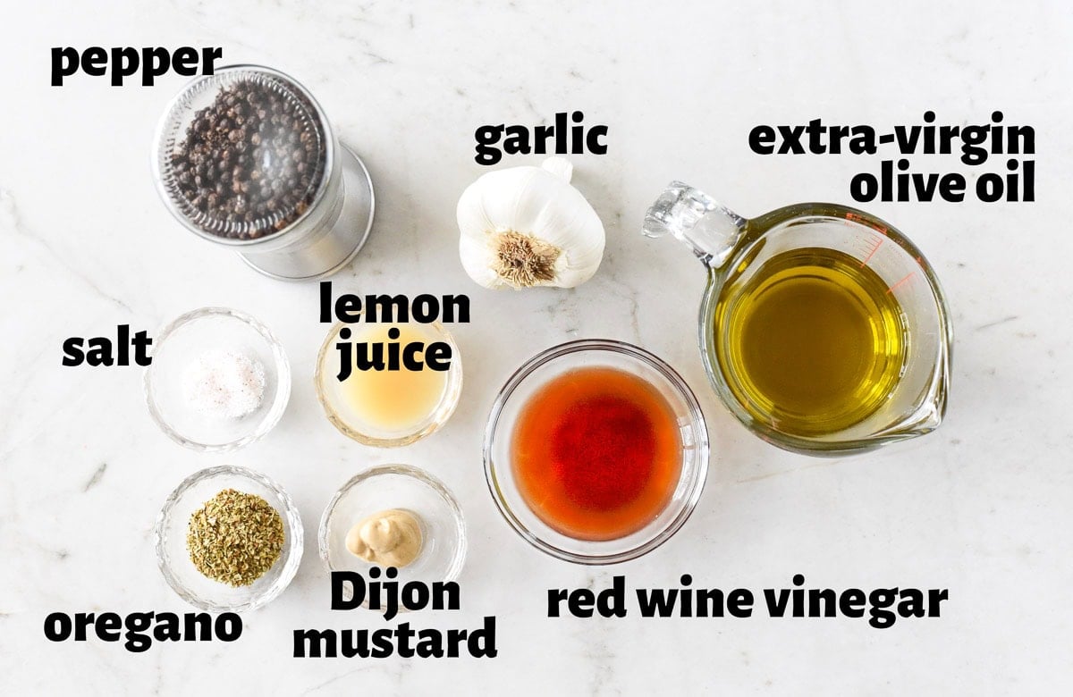 Labeled ingredients to make Greek Salad Dressing Recipe.