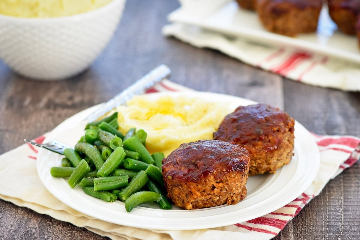 Meatloaf Muffins on plate with sides.
