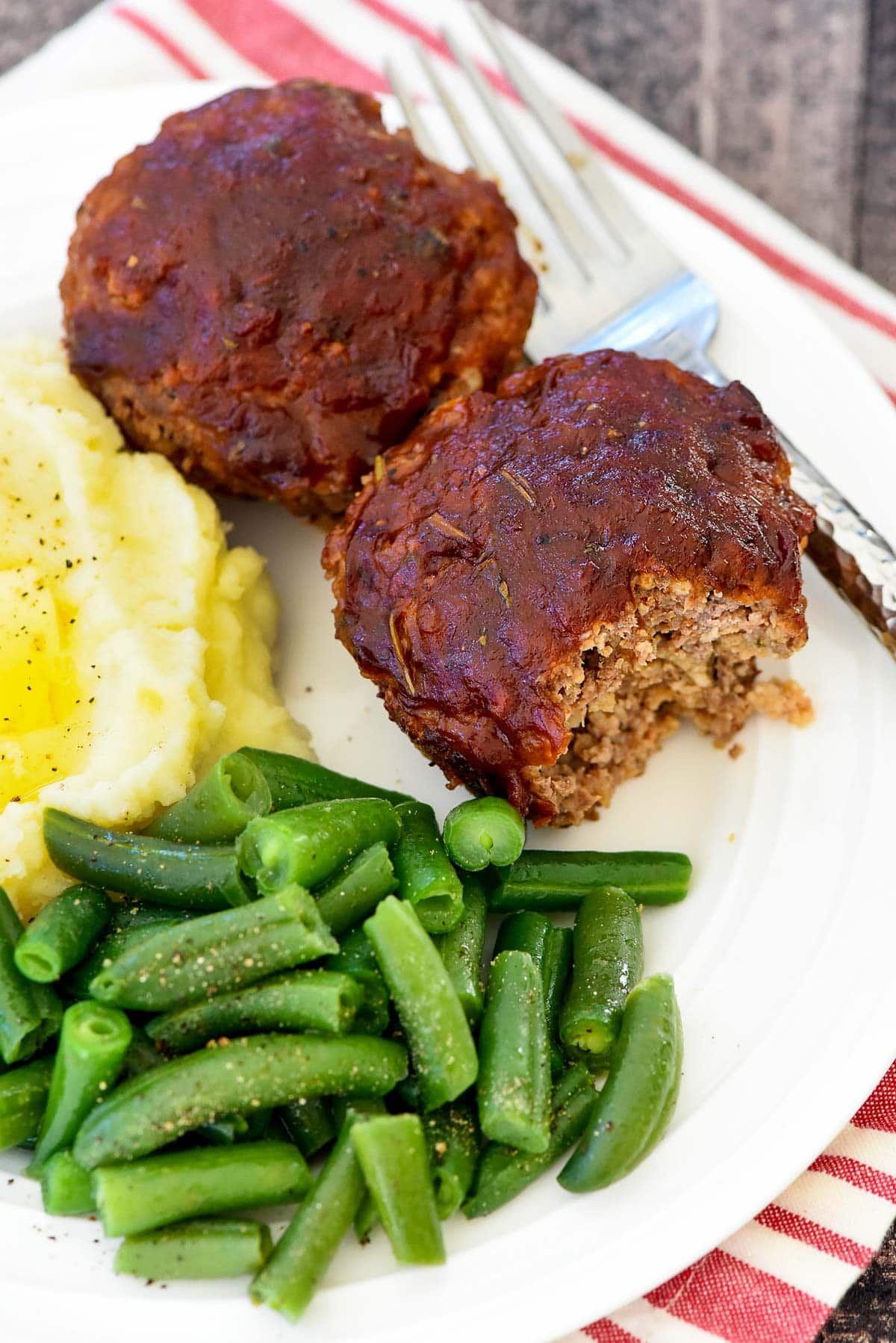 Meatloaf Muffins with missing bite.