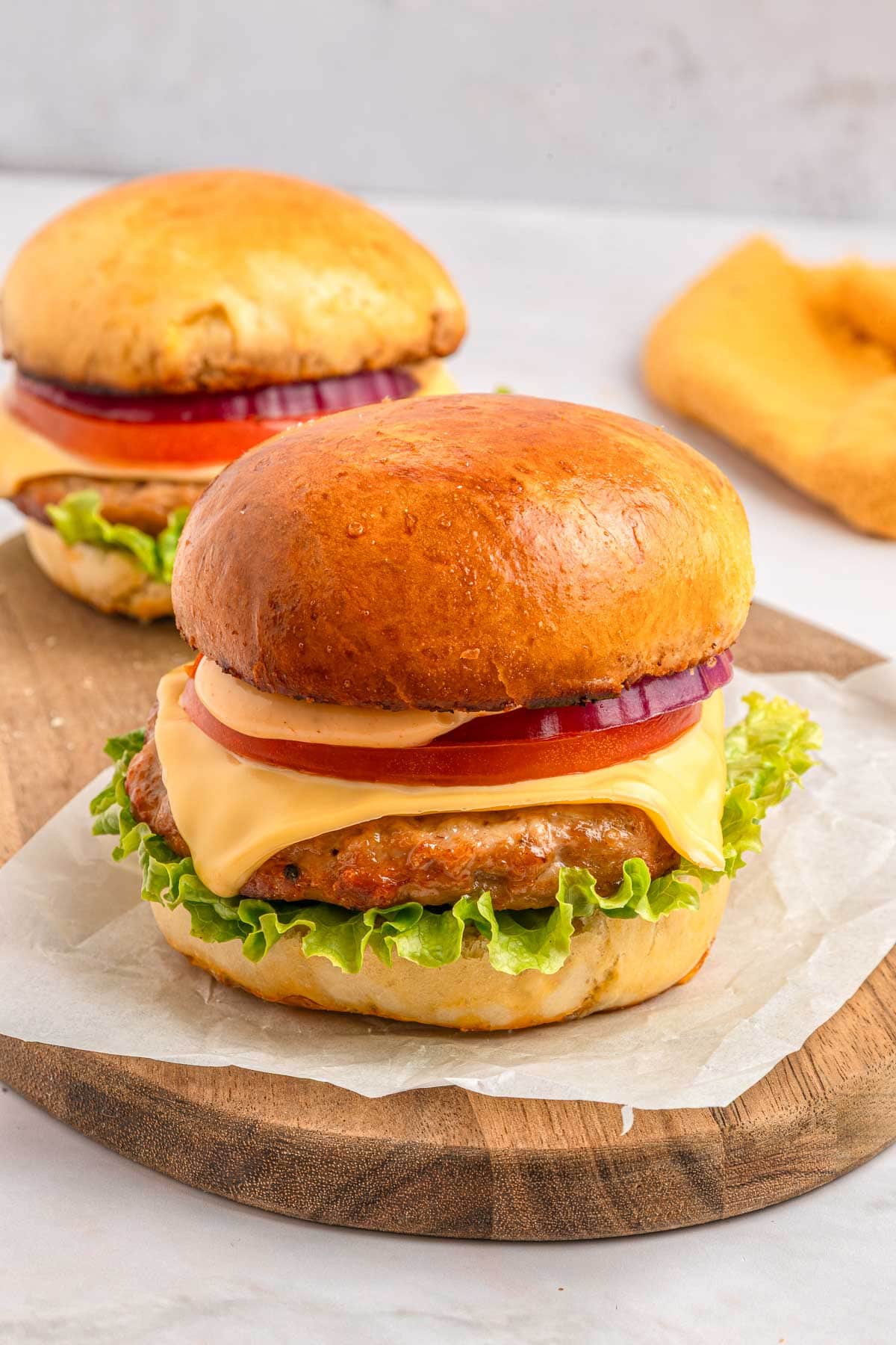 Chicken Burgers on table.