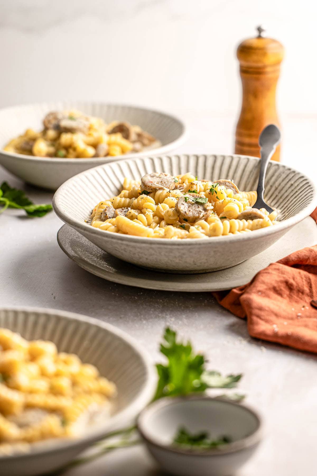 Chicken Sausage Pasta in bowls on table.