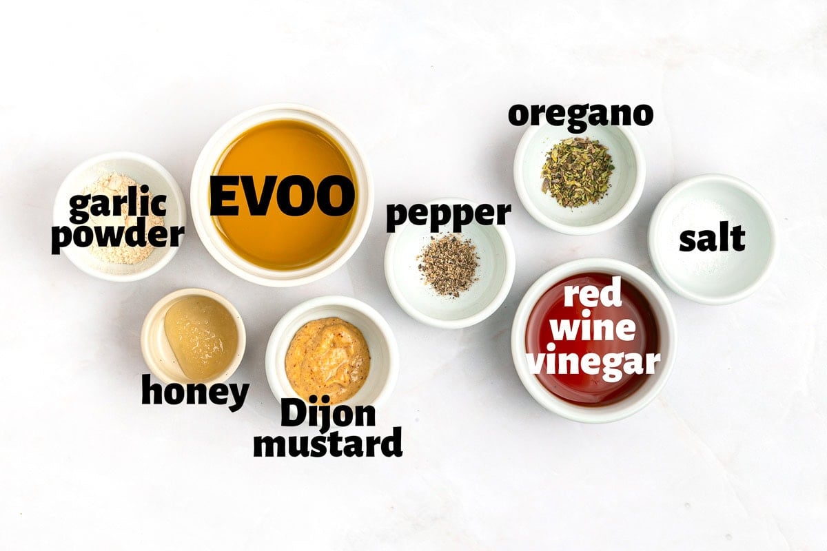 Labeled ingredients to make Red Wine Vinaigrette.