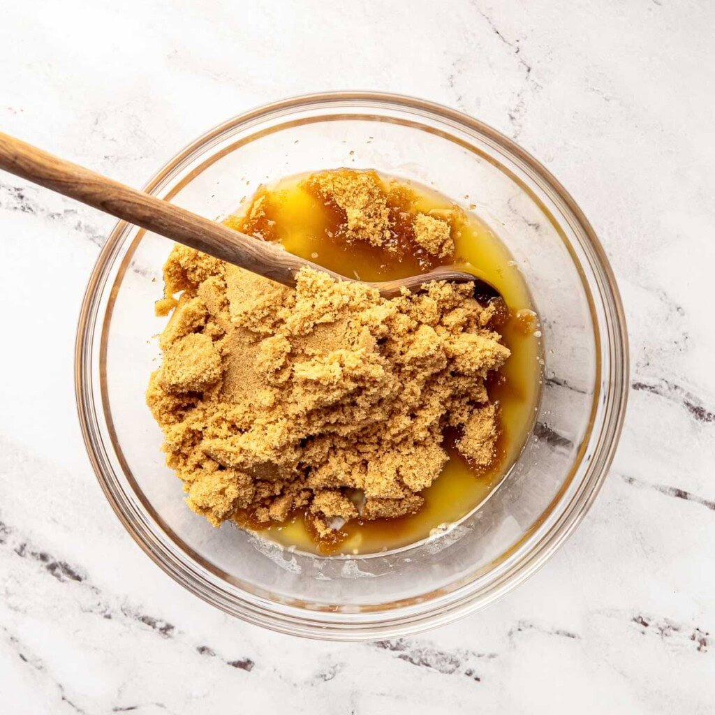 Butter and brown sugar in bowl.