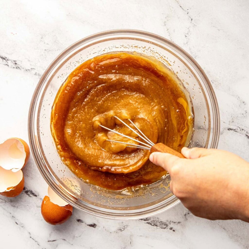 Whisking ingredients in bowl.