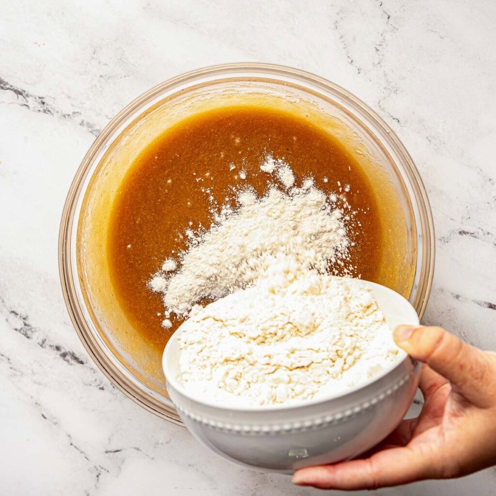 Adding flour.