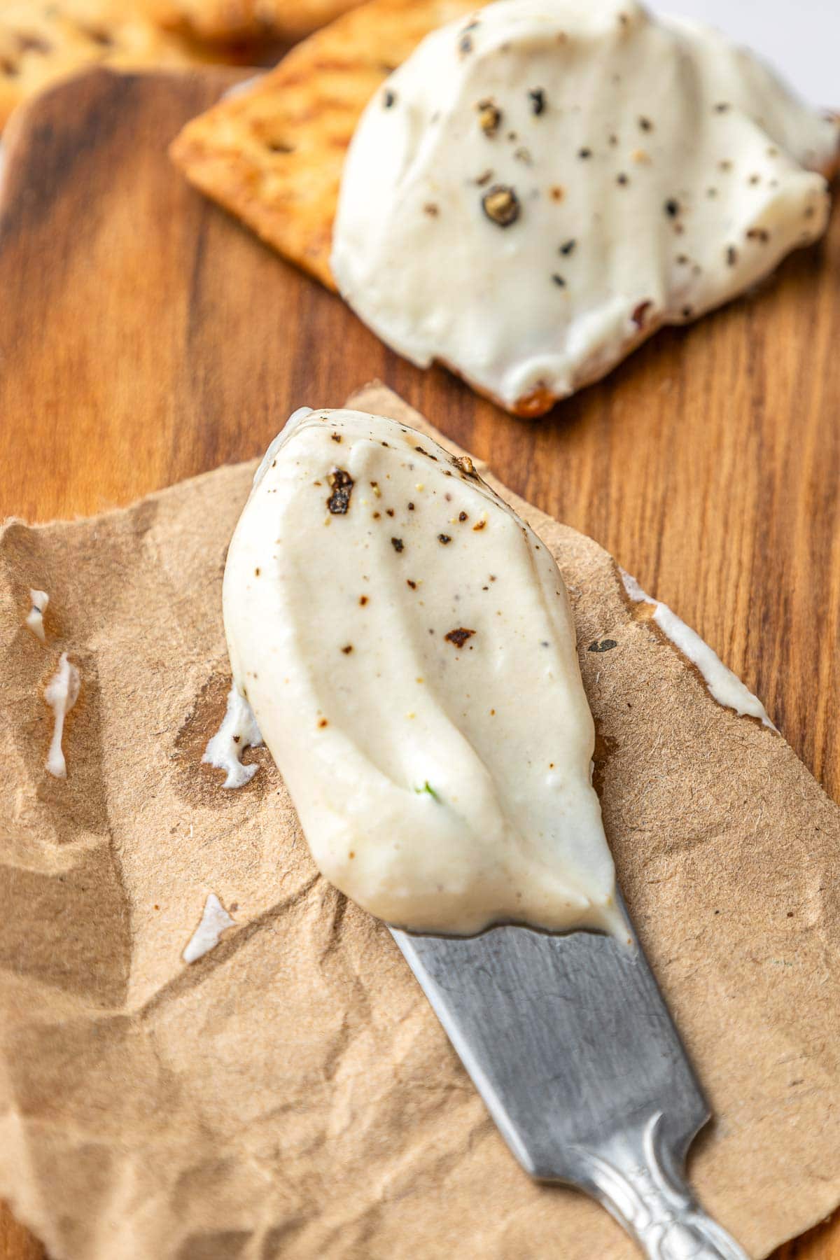 Cream Cheese Dip on knife close-up.