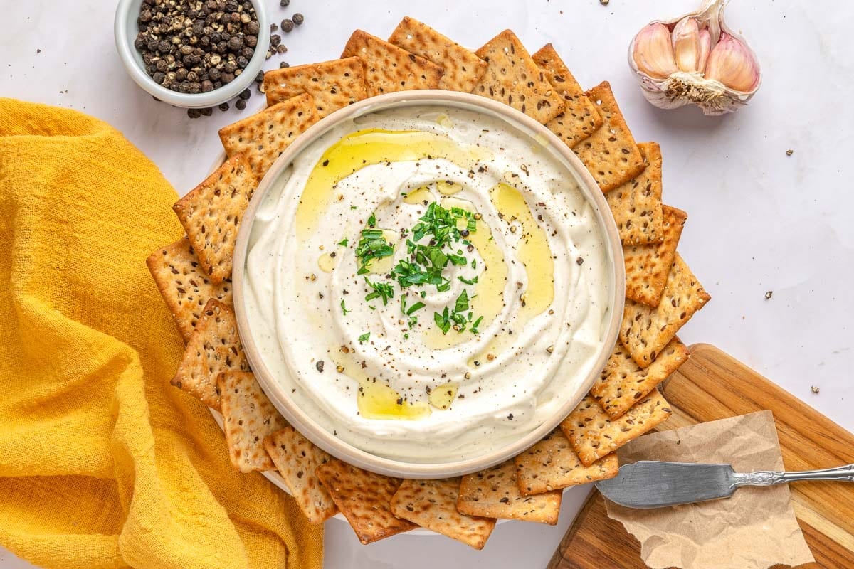 Cream Cheese Dip surrounded by crackers.