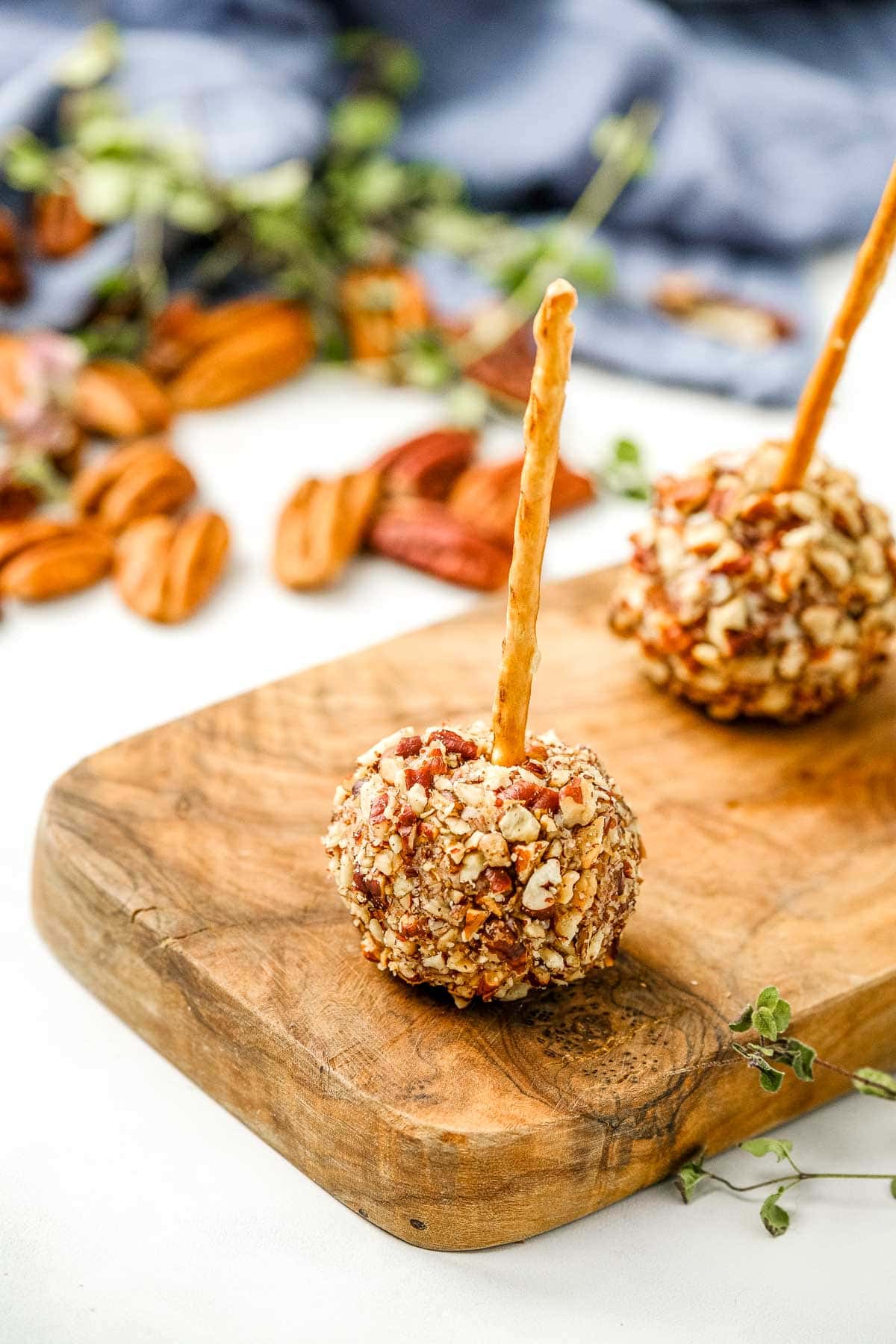Mini Cheese Balls close-up on wooden board.