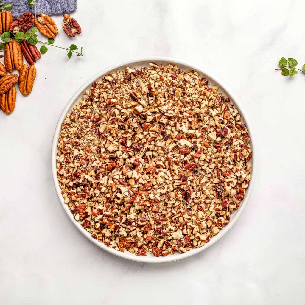 Chopped pecans for coating Mini Cheese Balls.