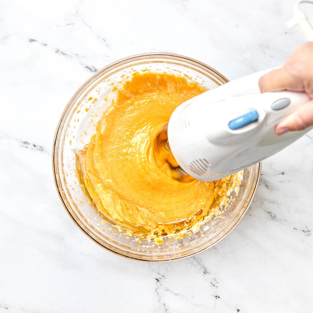 Wet ingredients blended together for Pumpkin Bars with Cream Cheese Frosting.