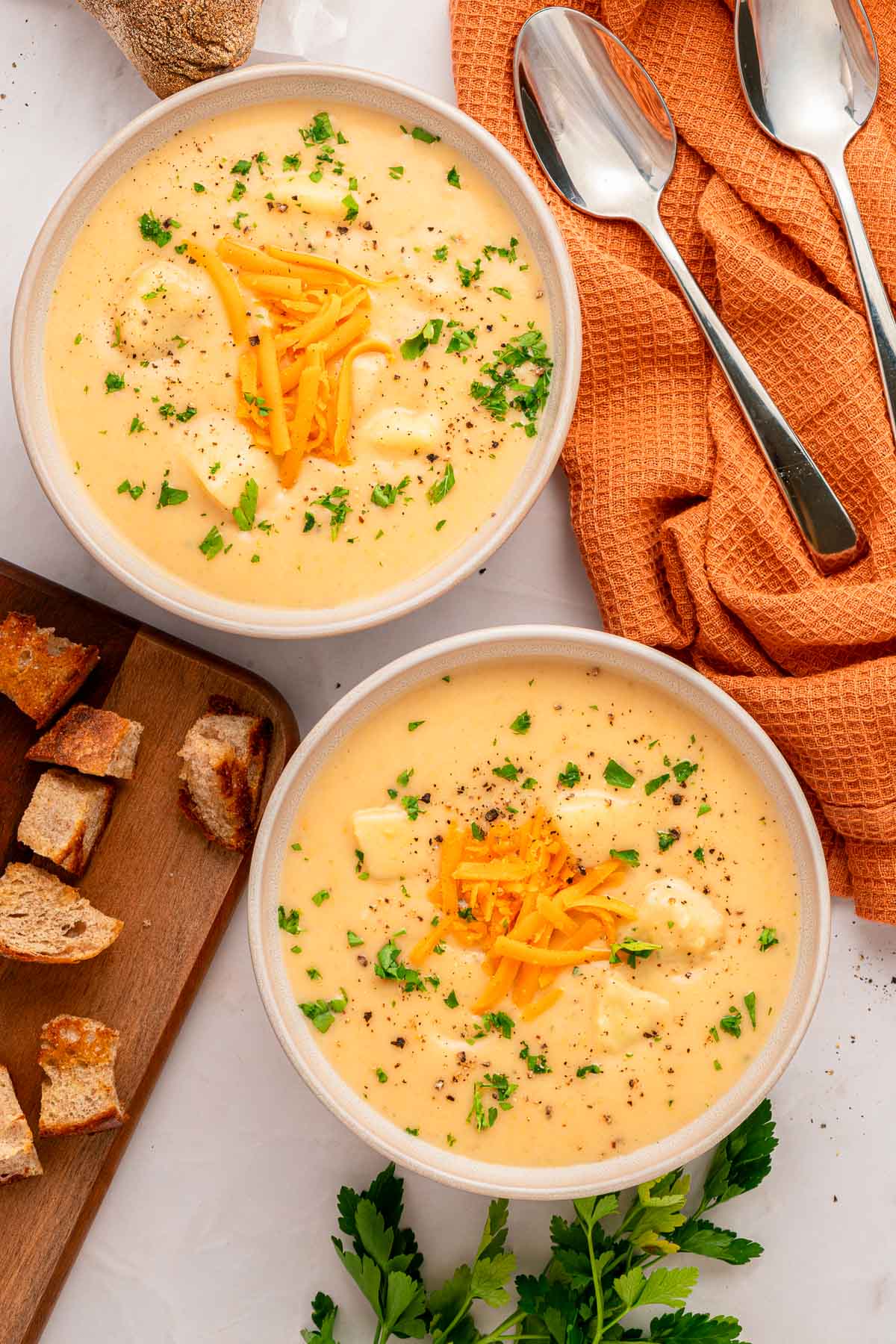 Cheesy Potato Soup aerial view in two bowls.