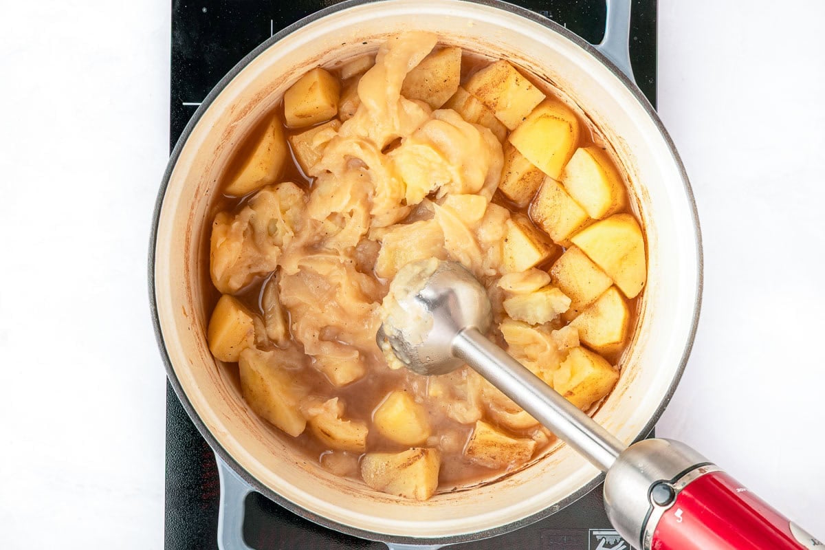 Pureeing with immersion blender.
