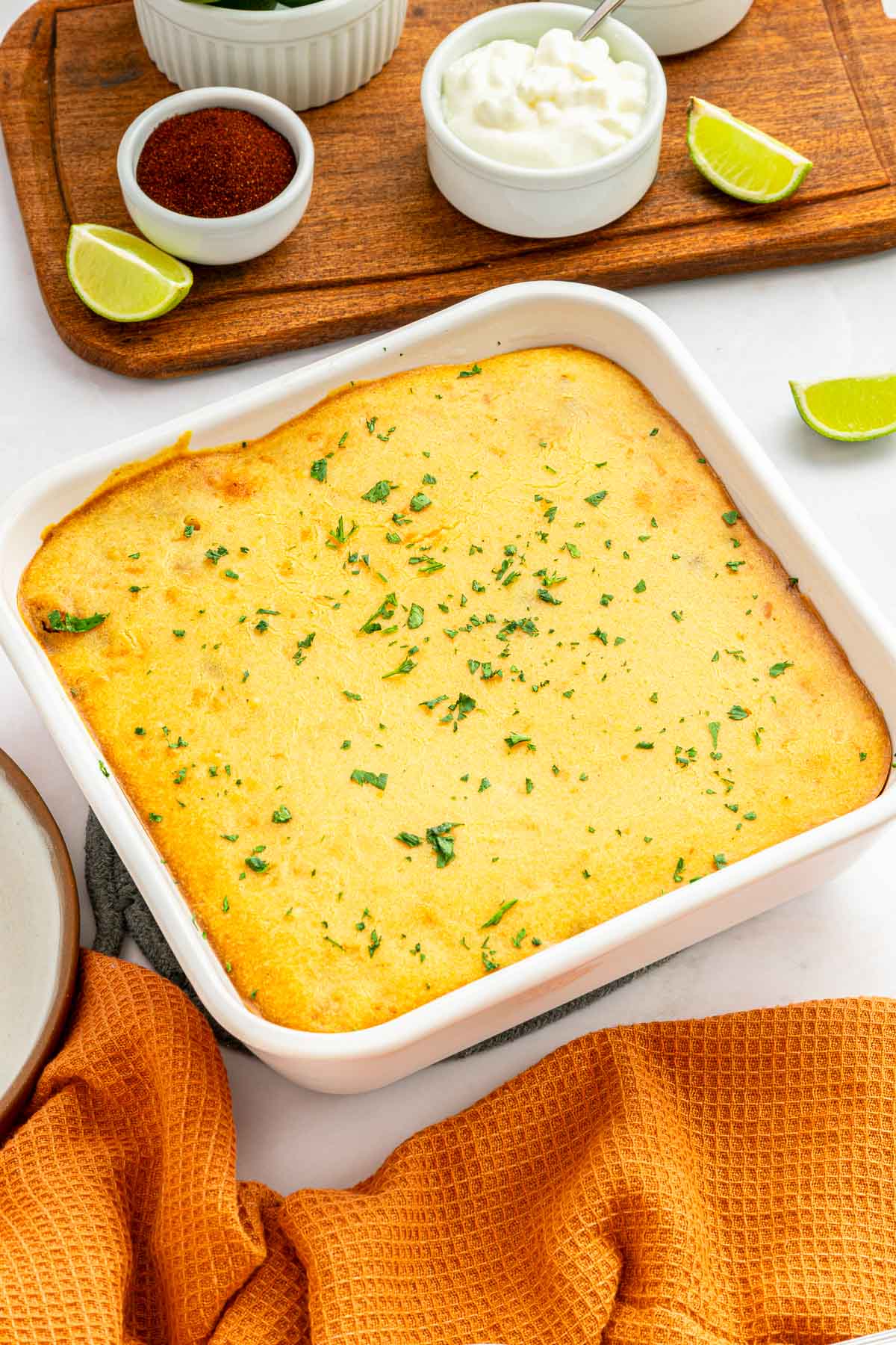 Chili Cornbread Casserole in baking dish with cilantro.