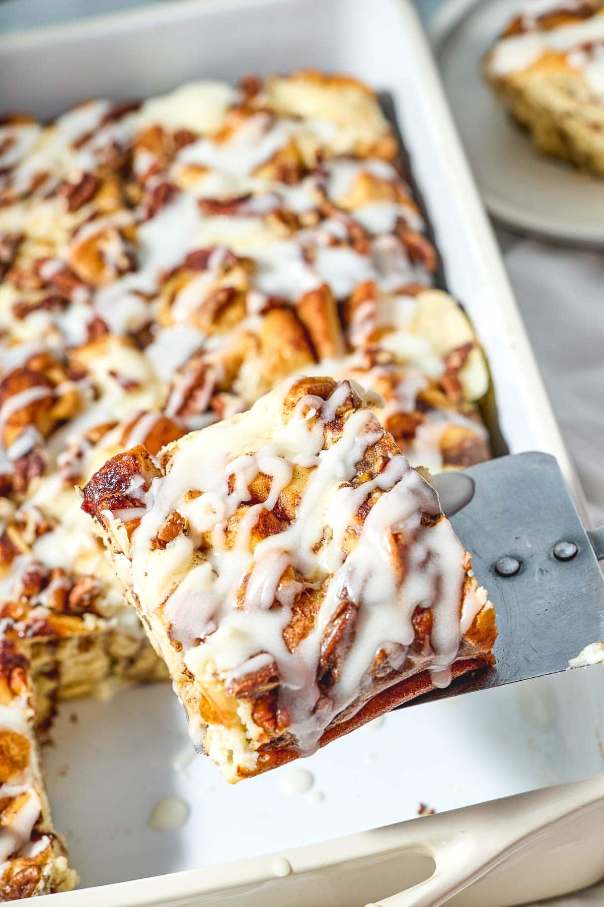 Cinnamon Roll Casserole cut into pieces.