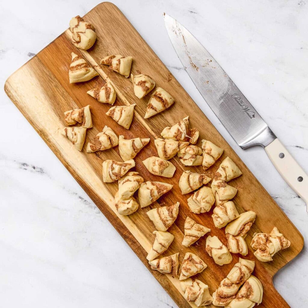 Refrigerated cinnamon rolls cut into pieces.