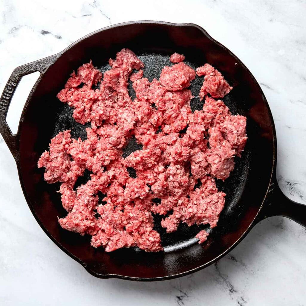 Ground beef in skillet.