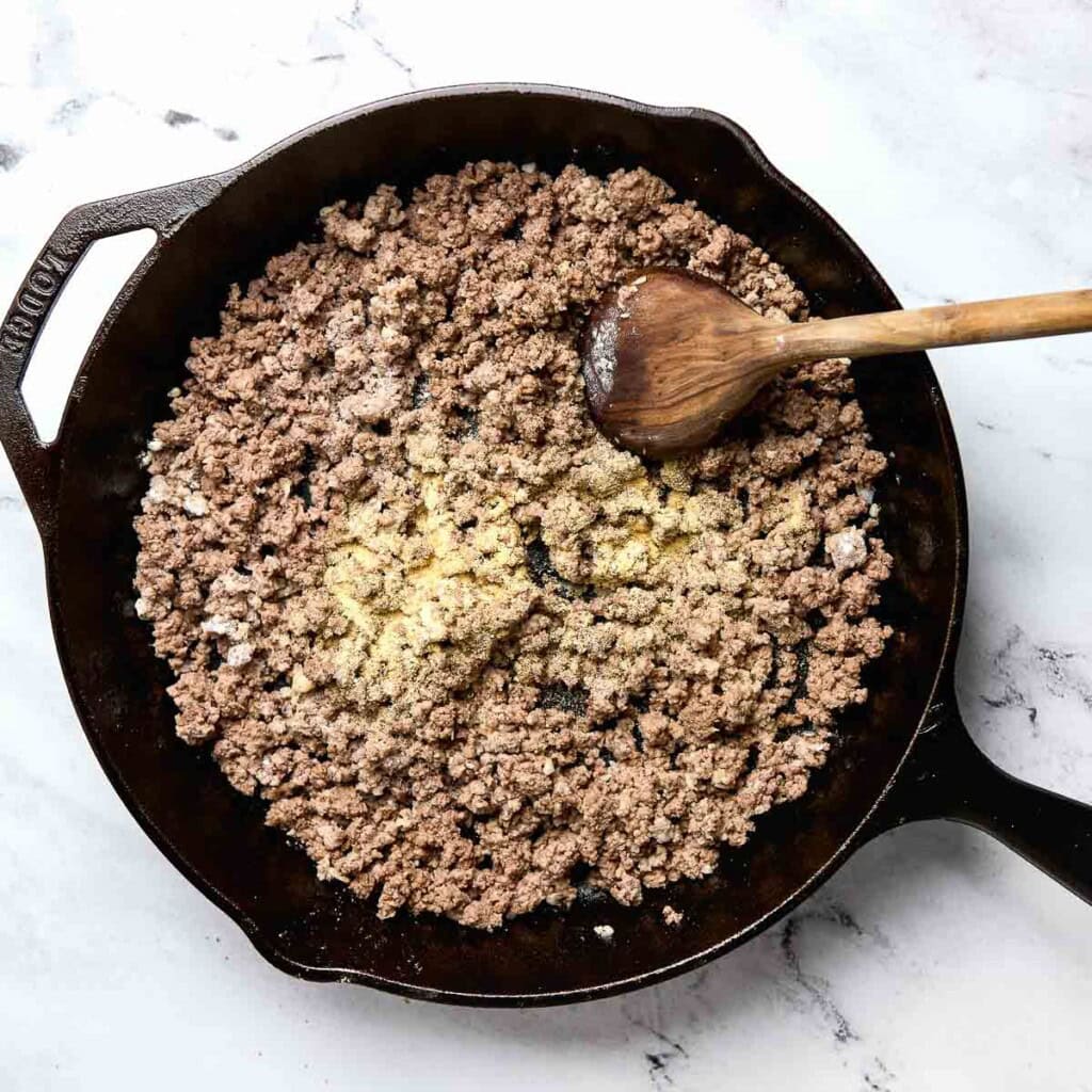 Seasonings added to pan.