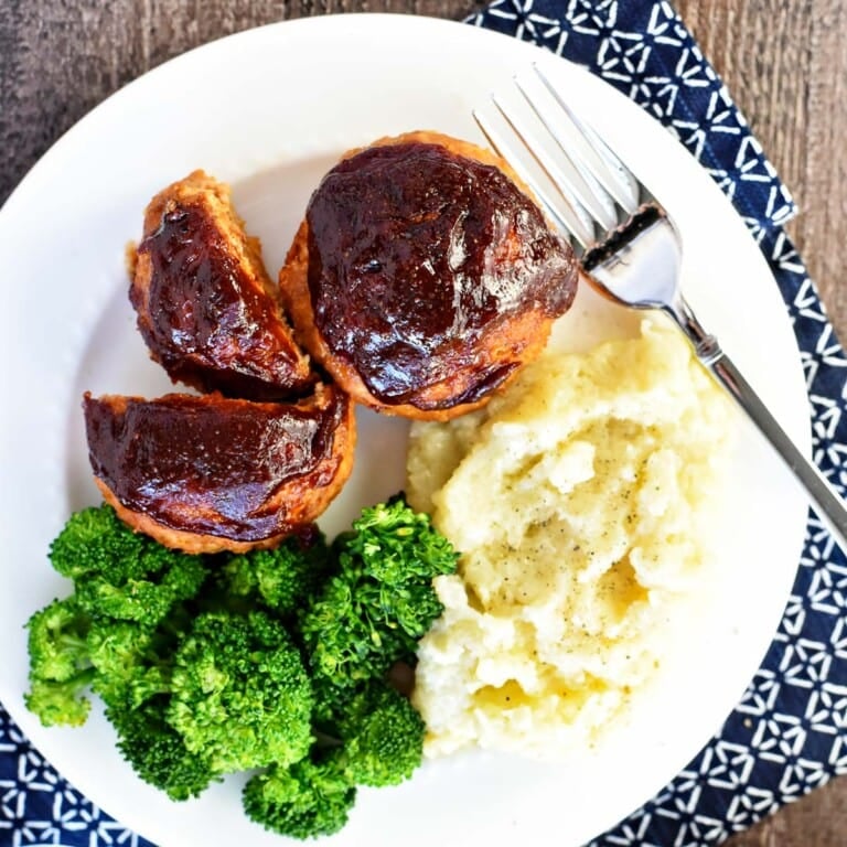 Turkey Meatloaf Muffins aerial view on plate with fork.