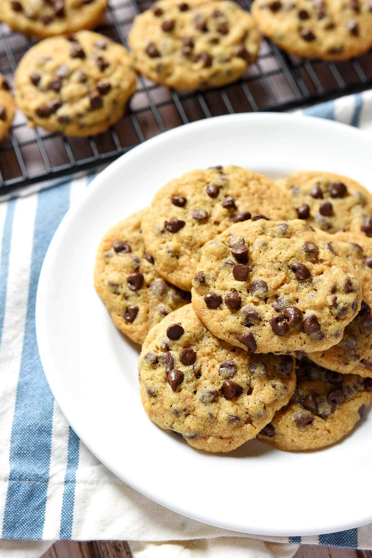 Whole Wheat Chocolate Chip Cookie recipe on plate and rack.
